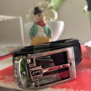 Black leather , logo crocodile .